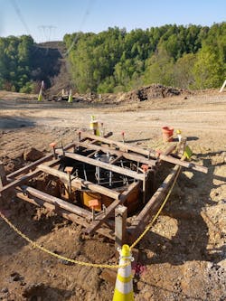 Anchor bolt cage suspended in formwork awaiting concrete. Anchor bolt cage suspended in formwork awaiting concrete.