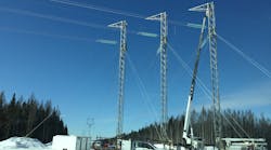 Three-mast guyed deadend structure installation. Three-mast guyed deadend structure installation.