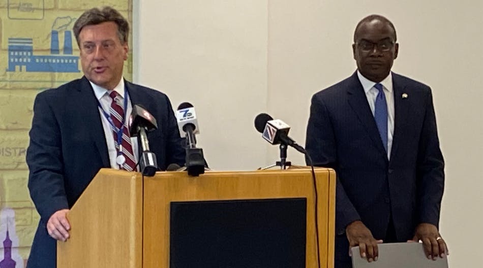 National Grid Regional Director Ken Kujawa, (left), introduces Buffalo Mayor Byron Brown (right) at the Aug. 8 kickoff event.