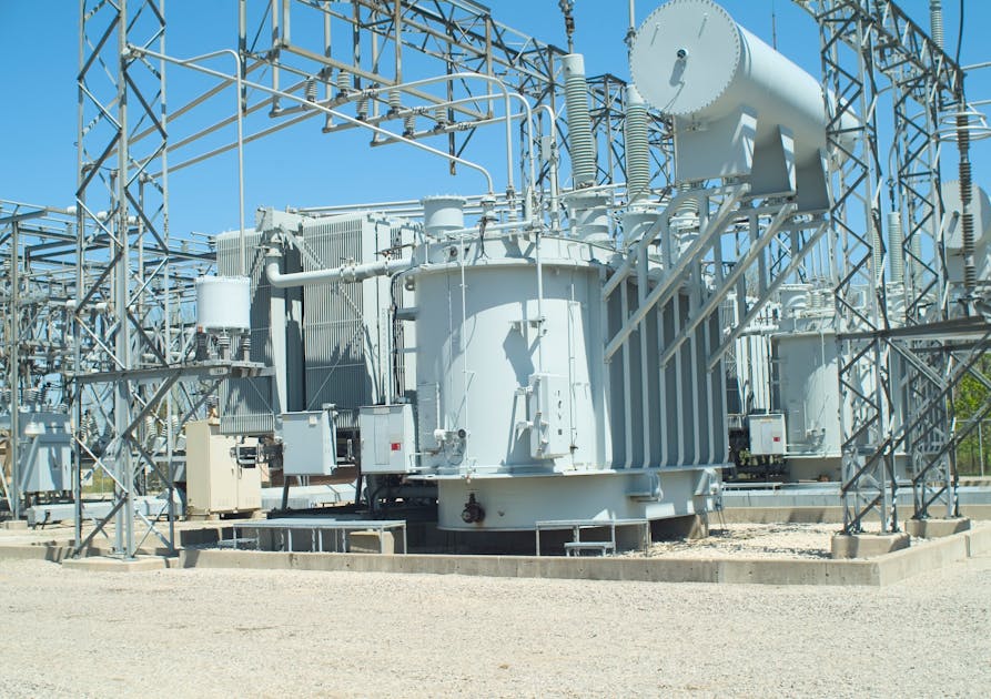 the high voltage power transformer substation. Close up Stock