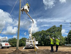 JOEMC workers putting distribution line equipment into place. Ensuring compliance with OSHA standards protects both employees and the organization. JOEMC workers putting distribution line equipment into place. Ensuring compliance with OSHA standards protects both employees and the organization.
