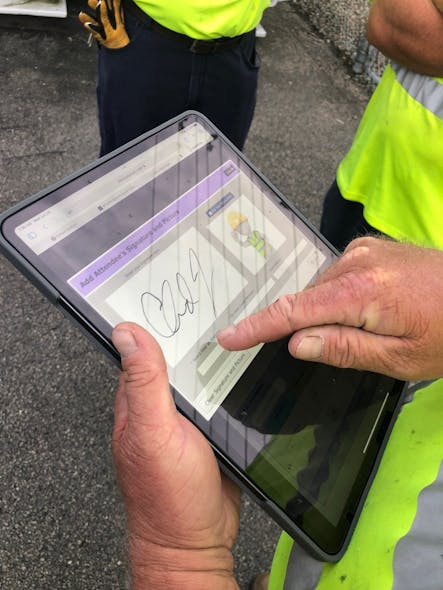 After completing all questions, line worker Chad Futrell electronically signs the safety job briefing acknowledging that the job briefing was discussed before work began.