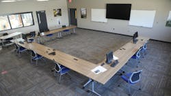 A conference room sits on the west end of the indoor training area.
