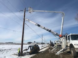 Crews work to replace poles following Winter Storm Wesley in 2019. Crews work to replace poles following Winter Storm Wesley in 2019.