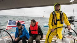 To support U.S. offshore wind energy projects, like Block Island Wind Farm (seen in this photo with NREL offshore wind energy researcher Walt Musial [middle]), an NREL team has evaluated the industry&apos;s workforce needs and opportunities.