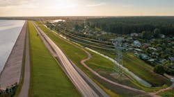 Completed 330-kV triple-conductored transmission line. Completed 330-kV triple-conductored transmission line.