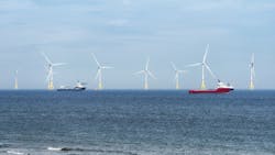 Wind turbines in an offshore wind farm near Aberdeen, Scotland. Wind turbines in an offshore wind farm near Aberdeen, Scotland.