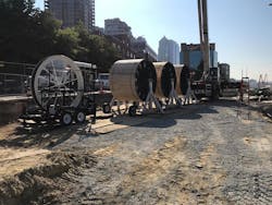 Reels of 115-kilovolt HPFF cable. Reels of 115-kilovolt HPFF cable.