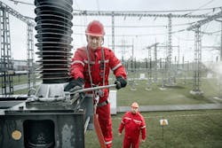 Contractor working at 330-kV Riga CHP-2 substation in Latvia. Contractor working at 330-kV Riga CHP-2 substation in Latvia.