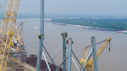 Because of the height of the towers and reach needed to install the top crossarms, a 900-ton crane was necessary, which also served as the primary steel erection crane; the 800-ton crane was used to transport personnel to minimize worker fatigue and assist with picks, when necessary. Because of the height of the towers and reach needed to install the top crossarms, a 900-ton crane was necessary, which also served as the primary steel erection crane; the 800-ton crane was used to transport personnel to minimize worker fatigue and assist with picks, when necessary.