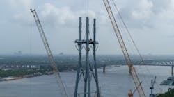 The crossing was designed to accommodate a double-circuit configuration, so a total of six conductors and two shield wires were pulled. The crossing was designed to accommodate a double-circuit configuration, so a total of six conductors and two shield wires were pulled.