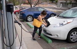 Kaedi Sanchez plugs in her car at a City of Albuquerque electric vehicle charger before heading to work. Sandia National Laboratories researchers have been studying the vulnerabilities of electric vehicle charging infrastructure, including public chargers, to better inform policymakers. Kaedi Sanchez plugs in her car at a City of Albuquerque electric vehicle charger before heading to work. Sandia National Laboratories researchers have been studying the vulnerabilities of electric vehicle charging infrastructure, including public chargers, to better inform policymakers.