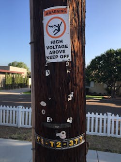 Passersby are warned not to climb this neighborhood distribution pole in southern California. Photo courtesy of Mike Beehler. Passersby are warned not to climb this neighborhood distribution pole in southern California. Photo courtesy of Mike Beehler.