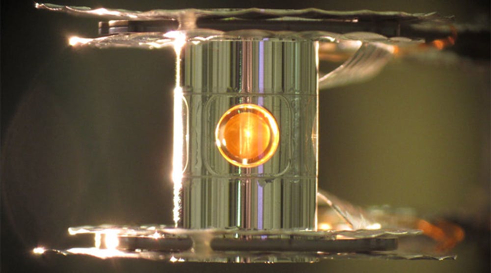A metallic case called a hohlraum holds the fuel capsule for NIF experiments. Target handling systems precisely position the target and freeze it to cryogenic temperatures (18 kelvins, or -427 degrees Fahrenheit) so that a fusion reaction is more easily achieved.