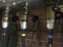 High Frequency Current Transformer (HFCT) Sensors clipped around the cable earth straps. High Frequency Current Transformer (HFCT) Sensors clipped around the cable earth straps.