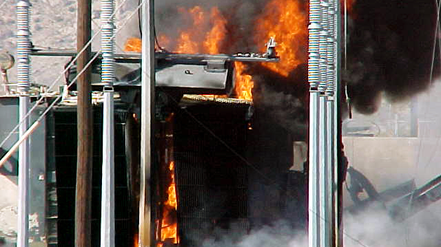 Burning transformer. Photo by Gene Wolf.