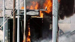 Burning transformer. Photo by Gene Wolf. Burning transformer. Photo by Gene Wolf.