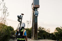 Osmose crew member using backpack OsmoVision technology to capture pole data that will be used in the pole loading analysis. Osmose crew member using backpack OsmoVision technology to capture pole data that will be used in the pole loading analysis.