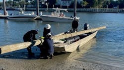 Dominion Energy South Carolina crew members from the Mount Pleasant operations center work to ensure the safe transport of equipment and a 40-foot, Class 4 wooden pole as they prepare to launch from a nearby marina on Isle of Palms, S.C. Dominion Energy South Carolina crew members from the Mount Pleasant operations center work to ensure the safe transport of equipment and a 40-foot, Class 4 wooden pole as they prepare to launch from a nearby marina on Isle of Palms, S.C.