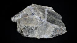 A sample of lithium spodumene pegmatite, a mineral source of the element lithium.
