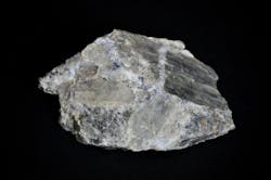 A sample of lithium spodumene pegmatite, a mineral source of the element lithium. A sample of lithium spodumene pegmatite, a mineral source of the element lithium.