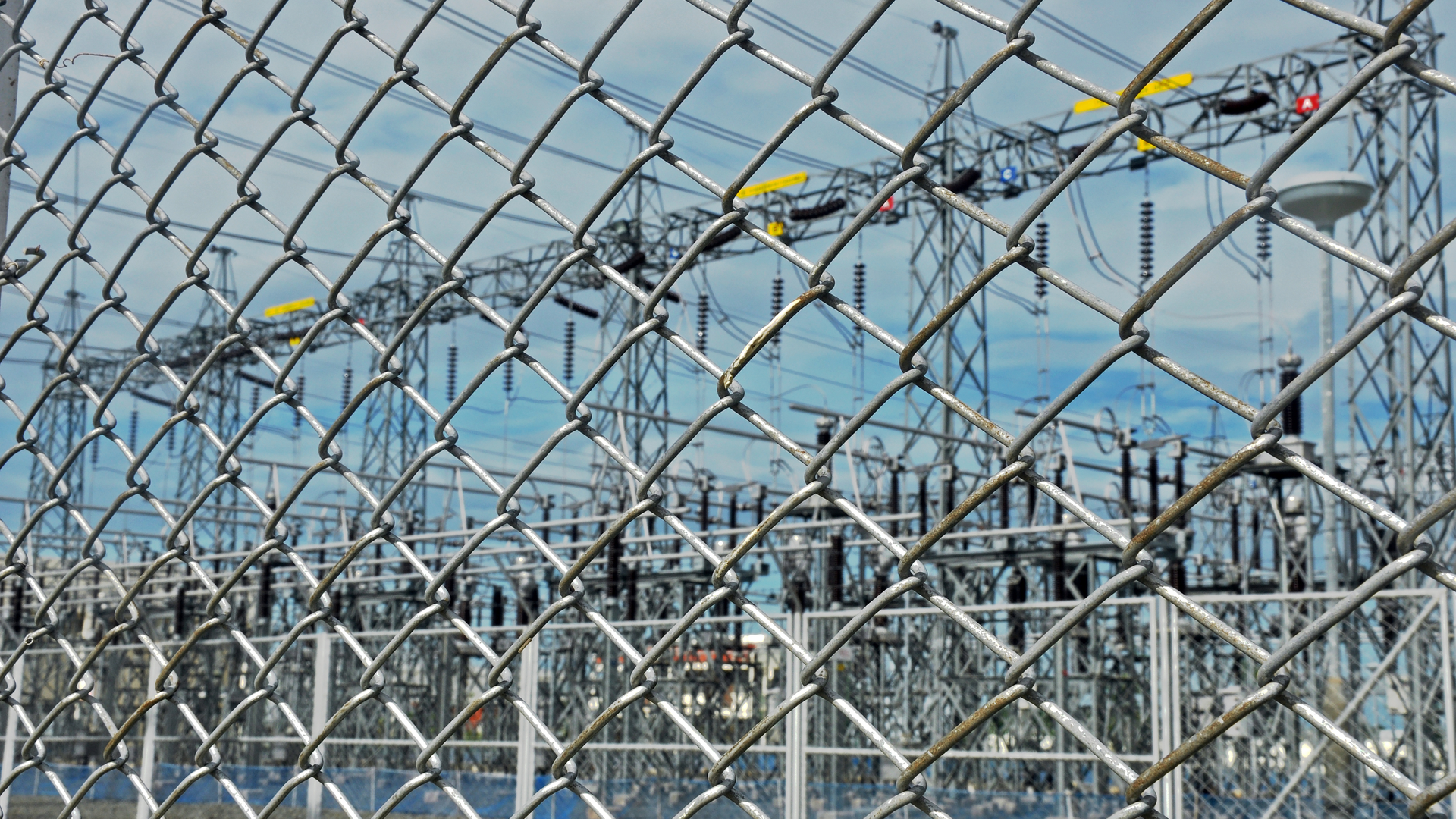 Fencing and other physical barriers are one method of area denial for power grid equipment, although no one solution guarantees safety.