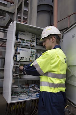 Technician conducts preventive maintenance on Doble condition monitoring solutions, which are designed to detect deterioration in bushings, find anomalies in insulation and monitor partial discharges in equipment such as transformers, rotating machines, cables and switchgear.