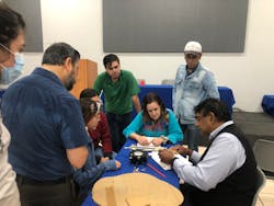 At a tree biomechanics workshop in Guadalajara, Mexico in August 2022, the group observes a fractometer, a mechanical measurement device determining characteristic values of bending and compression strength of wood evaluating samples taken from tropical ash (Fraxinus uhdei) trees. At a tree biomechanics workshop in Guadalajara, Mexico in August 2022, the group observes a fractometer, a mechanical measurement device determining characteristic values of bending and compression strength of wood evaluating samples taken from tropical ash (Fraxinus uhdei) trees.