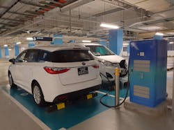 BYD vehicles charge at a parking garage in Singapore. BYD is an EV maker with headquarters in Shenzhen, Guangdong, China, which is the country currently leading the world in new EV sales.