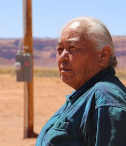 Monument Valley, Arizona resident Clara Luna planned to bring her refrigerator home. It was stored at her son’s home nearby. She had also learned to read and was happy that she could turn on the lights to read at night. Photo courtesy of APPA – Alysa Landry. Monument Valley, Arizona resident Clara Luna planned to bring her refrigerator home. It was stored at her son’s home nearby. She had also learned to read and was happy that she could turn on the lights to read at night. Photo courtesy of APPA – Alysa Landry.