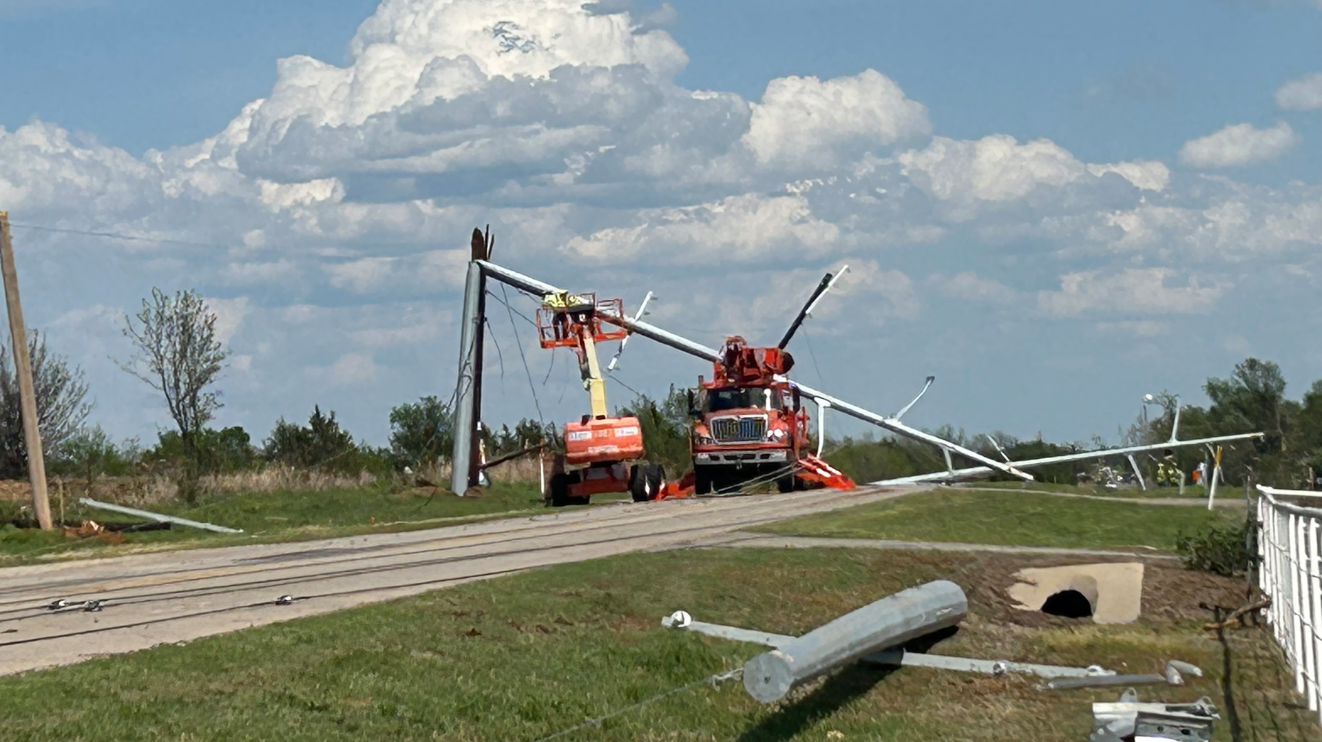 OG&E crews repaired damage and restored power in Shawnee, Oklahoma, after tornadoes, large hail and damaging winds with 70 mph wind gusts moved through the area.