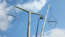 T Pylon Diamond Insulators Being Installed 64cd6da70d034 T Pylon Diamond Insulators Being Installed 64cd6da70d034