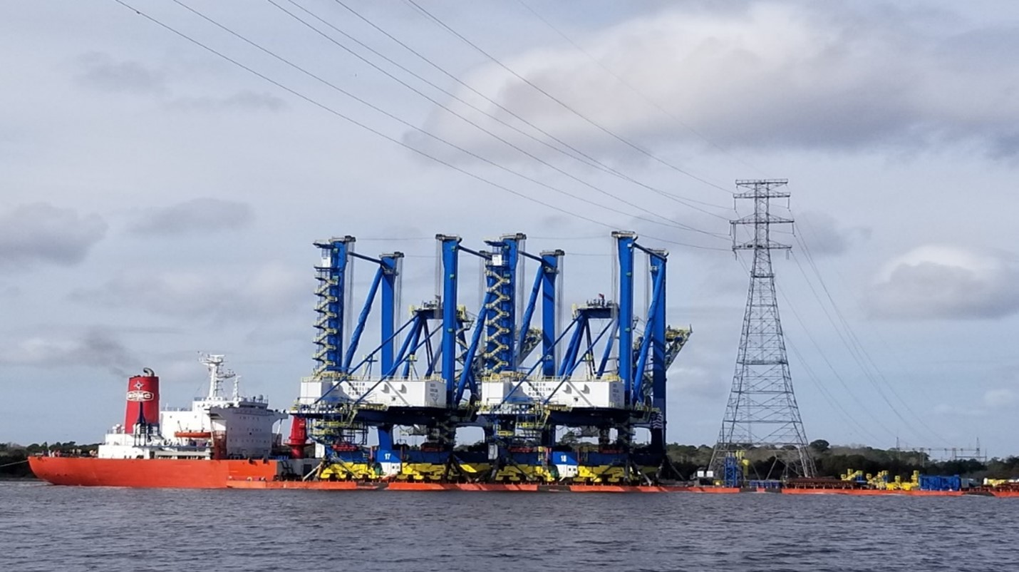 New Neo-Panamax cranes passing under the transmission line crossing.