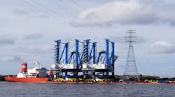 New Neo-Panamax cranes passing under the transmission line crossing.