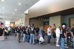 Lineworkers lined up around the hall to wait for the opportunity to enter the Lineman’s Expo and discover the latest tools, technologies, products and services for the line trade. Lineworkers lined up around the hall to wait for the opportunity to enter the Lineman’s Expo and discover the latest tools, technologies, products and services for the line trade.