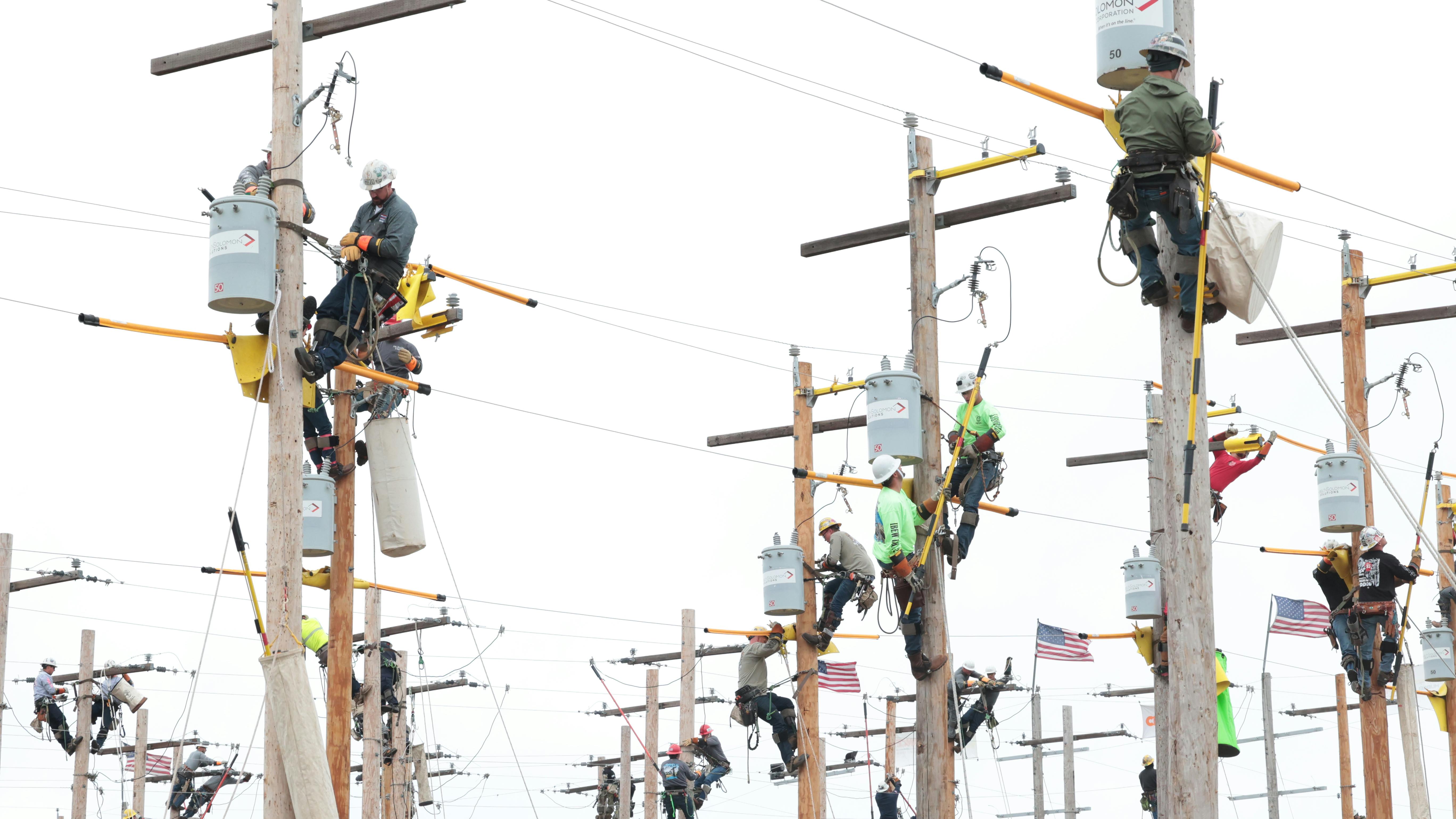 The journeyman lineworker teams had to compete in full fall protection in teams of three at the 2023 International Lineman&rsquo;s Rodeo.
