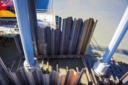 40-foot-deep sheet pile with structural steel bracing protects the transmission tower foundations from flood damage. 40-foot-deep sheet pile with structural steel bracing protects the transmission tower foundations from flood damage.