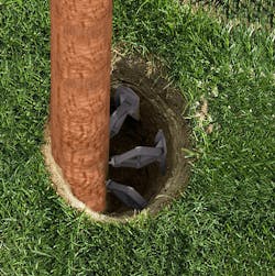 This rendering shows how the jacks push against the hole and spike into the poles to keep them in place until concrete can be poured, This rendering shows how the jacks push against the hole and spike into the poles to keep them in place until concrete can be poured,