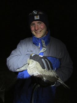 The author with a sage grouse, a ground-dwelling bird vulnerable to habitat disruption. The author with a sage grouse, a ground-dwelling bird vulnerable to habitat disruption.