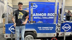 After qualifying to be in the top 16 in the PLP Armor Rod Challenge at the 2023 International Lineman’s Expo, Midwest Energy's Theron Tucker won the championship round by installing a set of Armor Rods and a distribution tie in just 39 seconds. After qualifying to be in the top 16 in the PLP Armor Rod Challenge at the 2023 International Lineman’s Expo, Midwest Energy's Theron Tucker won the championship round by installing a set of Armor Rods and a distribution tie in just 39 seconds.
