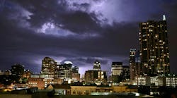 A thunderstorm strikes Austin. Severe weather is causing constrained power grid conditions in both winter and summer.