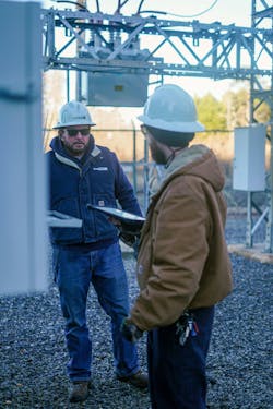 EnergyUnited substation inspectors Dustin McGuire (front) and Phil Briggs (back) use eSMART to complete a substation inspection. EnergyUnited substation inspectors Dustin McGuire (front) and Phil Briggs (back) use eSMART to complete a substation inspection.