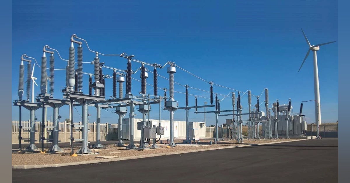 A substation on the backdrop of a blue cloudless sky.