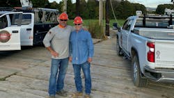 Nick “Check Stub” Cummins is shown working on the line with his father, David “Check Check” Cummins. Nick “Check Stub” Cummins is shown working on the line with his father, David “Check Check” Cummins.