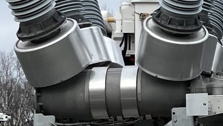 The bands on this circuit breaker tank are heating elements, which keep the SF6 gas inside warm in the dead of winter.