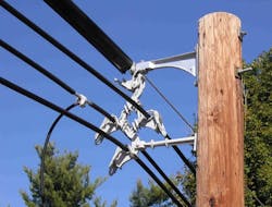 Spacer cable system. Spacer cable system.