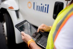 A Unitil field worker using a mobile tablet. Unitil performs regular cyber threat assessments throughout the year. A Unitil field worker using a mobile tablet. Unitil performs regular cyber threat assessments throughout the year.