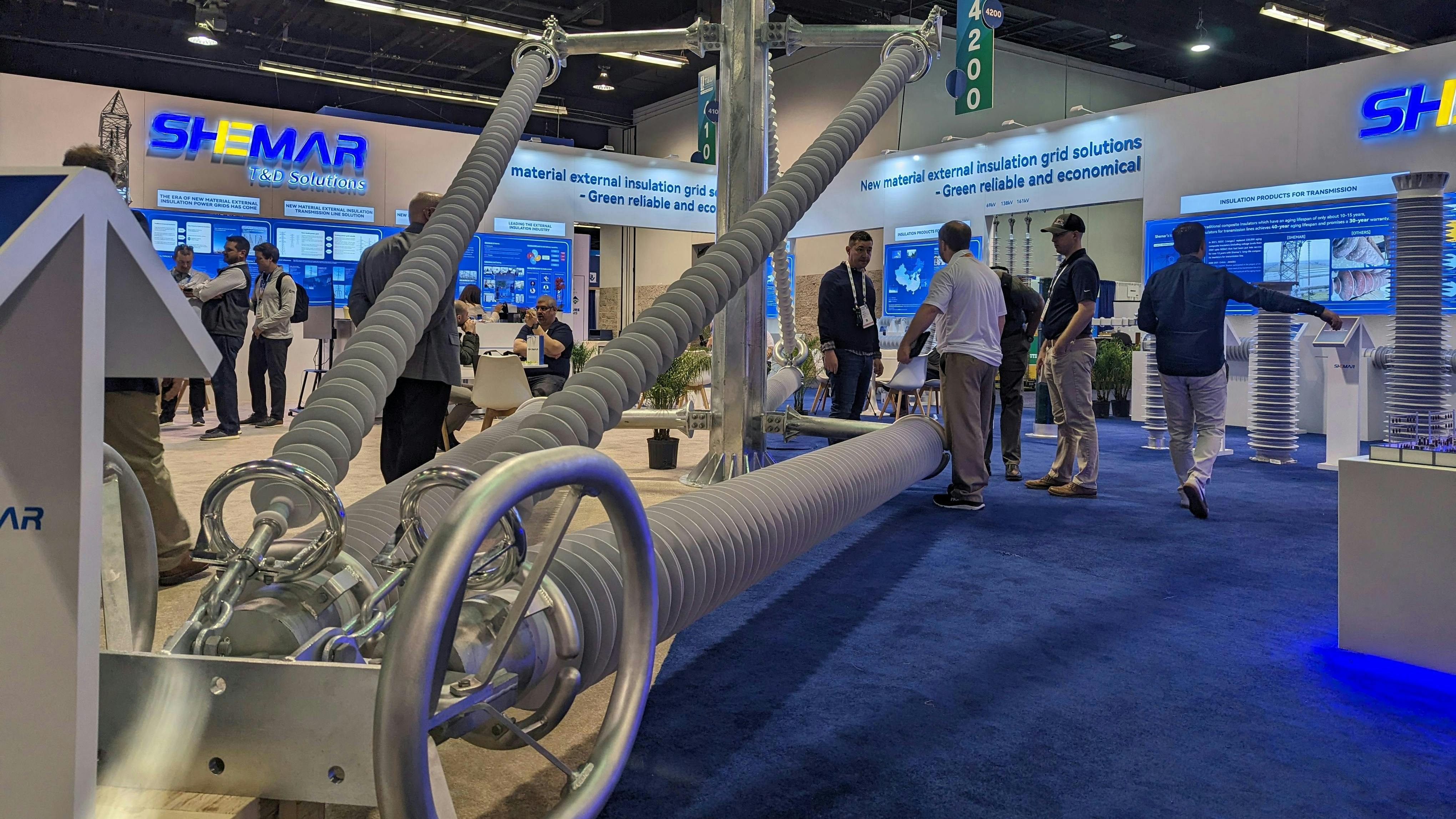 Monopole power transmission equipment by Jiangsu SHEMAR Power Co. on the IEEE PES T&D show floor.