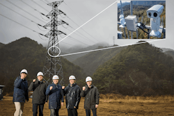 A transmission tower with a camera mounted for wildfire detection. A transmission tower with a camera mounted for wildfire detection.