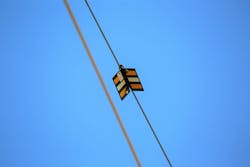 Colorado-based Power Line Sentry, an animal mitigation firm, worked with ornithologists and bird ophthalmologists to develop the diverters with the shape, color and visibility in their design that would make them most effective in their job of warning birds from danger. Colorado-based Power Line Sentry, an animal mitigation firm, worked with ornithologists and bird ophthalmologists to develop the diverters with the shape, color and visibility in their design that would make them most effective in their job of warning birds from danger.